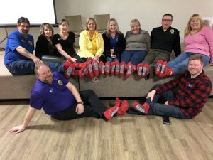 Lions Club of Cobourg keeping their feet warm AND supporting United Way