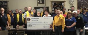 Proceeds from New Years Eve fundraiser being presented to Salvation Army Outreach program